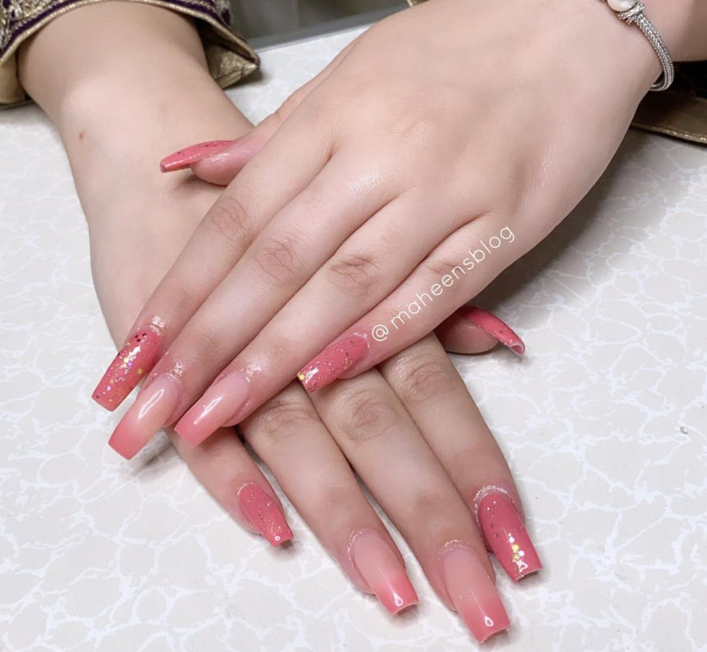 Coral Ombre nails with glitter