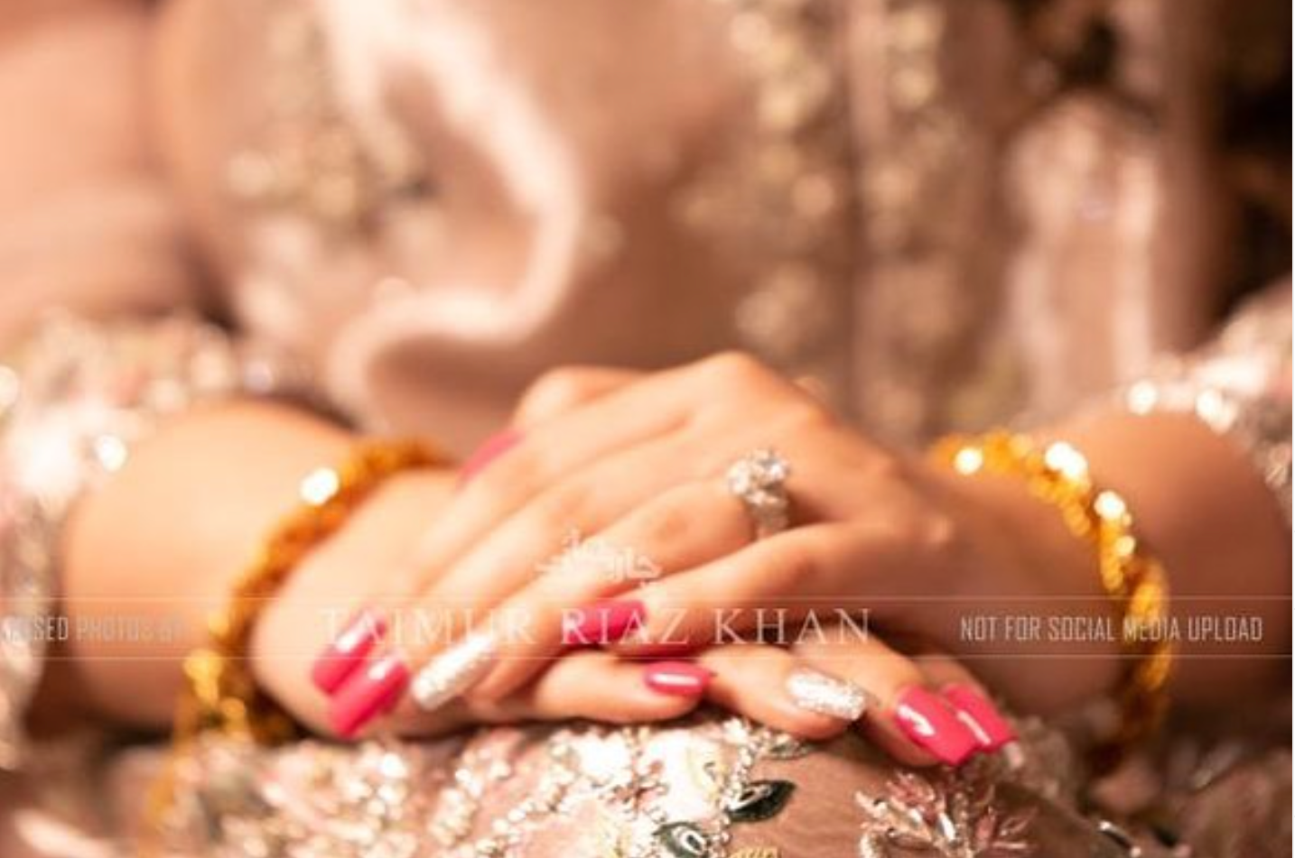 Hot pink nails with glitter accent nails